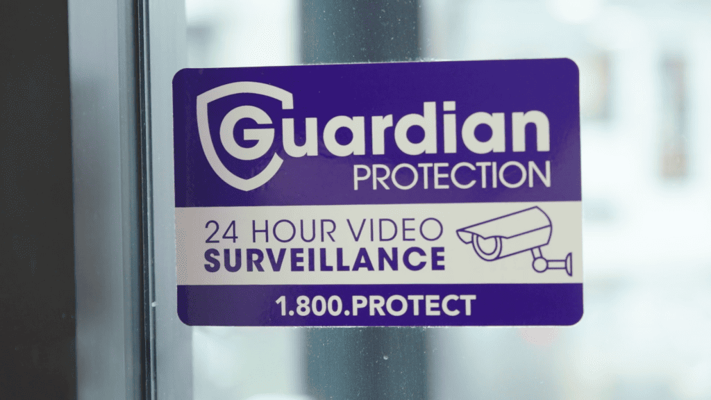 Guardian Protection sticker showing 24-surveillance 