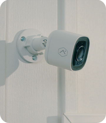 One of Guardian's outdoor home security cameras installed on home's exterior