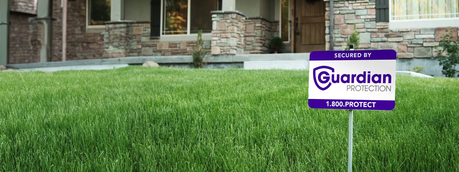 Guardian Protection home security yard sign in front yard
