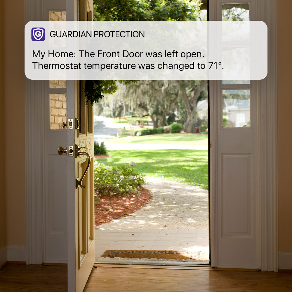 Front door of home open with a Guardian app notification with smart thermostat alert