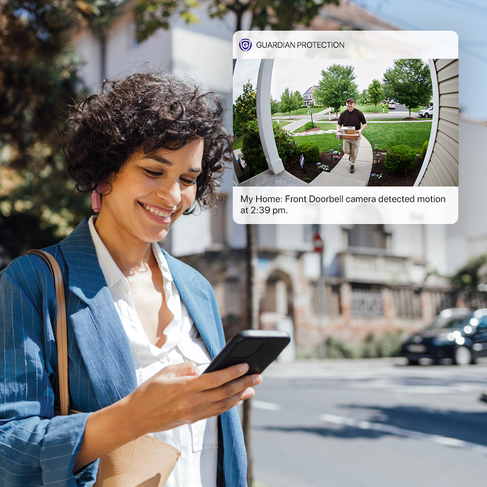 Woman viewing package delivery from video doorbell camera on the Guardian app