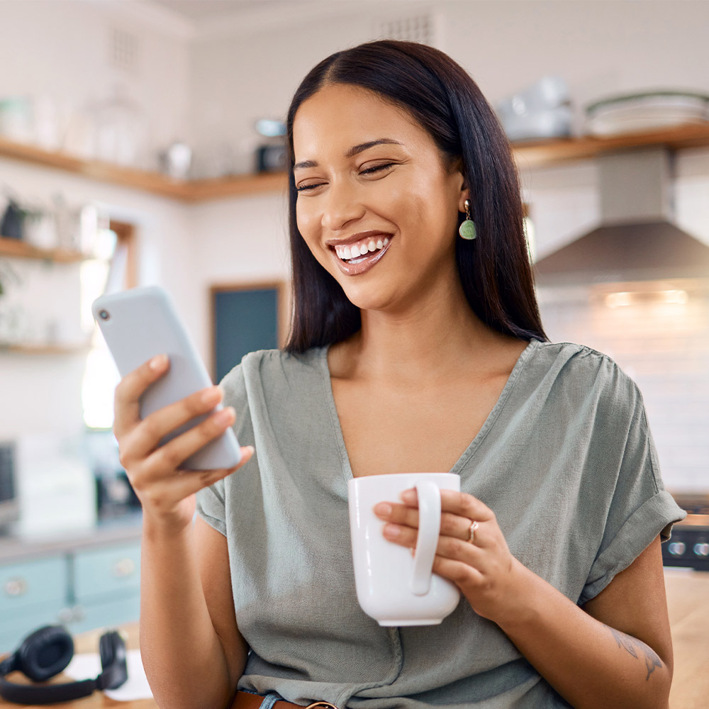 Woman managing her smart home automation system from the Guardian app
