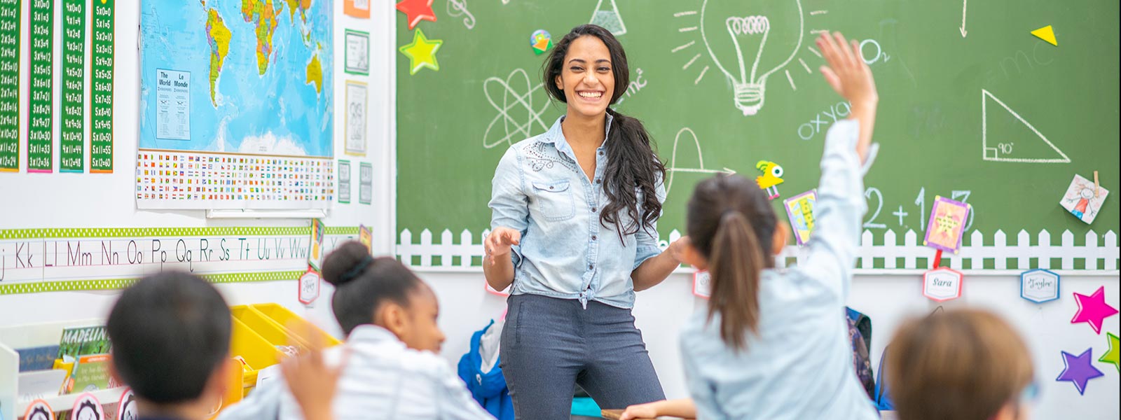 Teacher in front of classroom