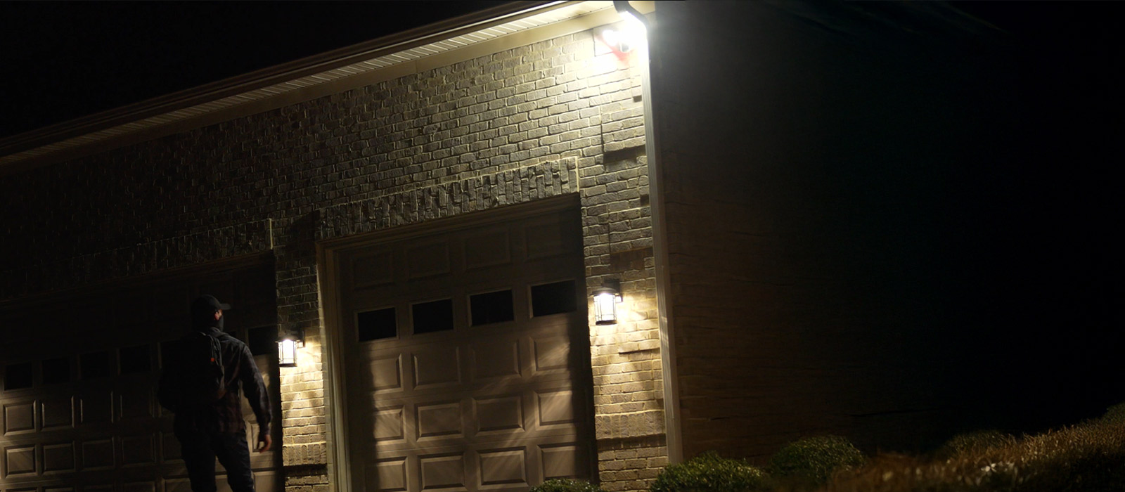 Intruder standing in front of home caught by Guardian Protection's smart floodlight camera