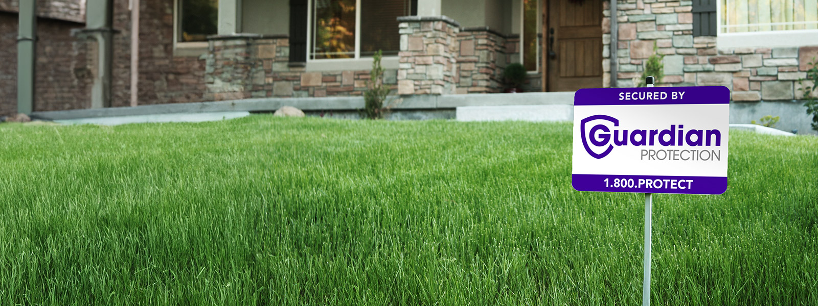 Guardian Protection yard sign in front of house