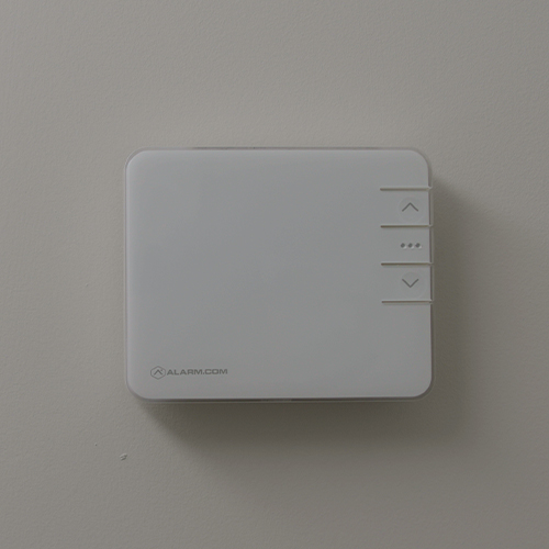 Guardian Protection smart thermostat on wall