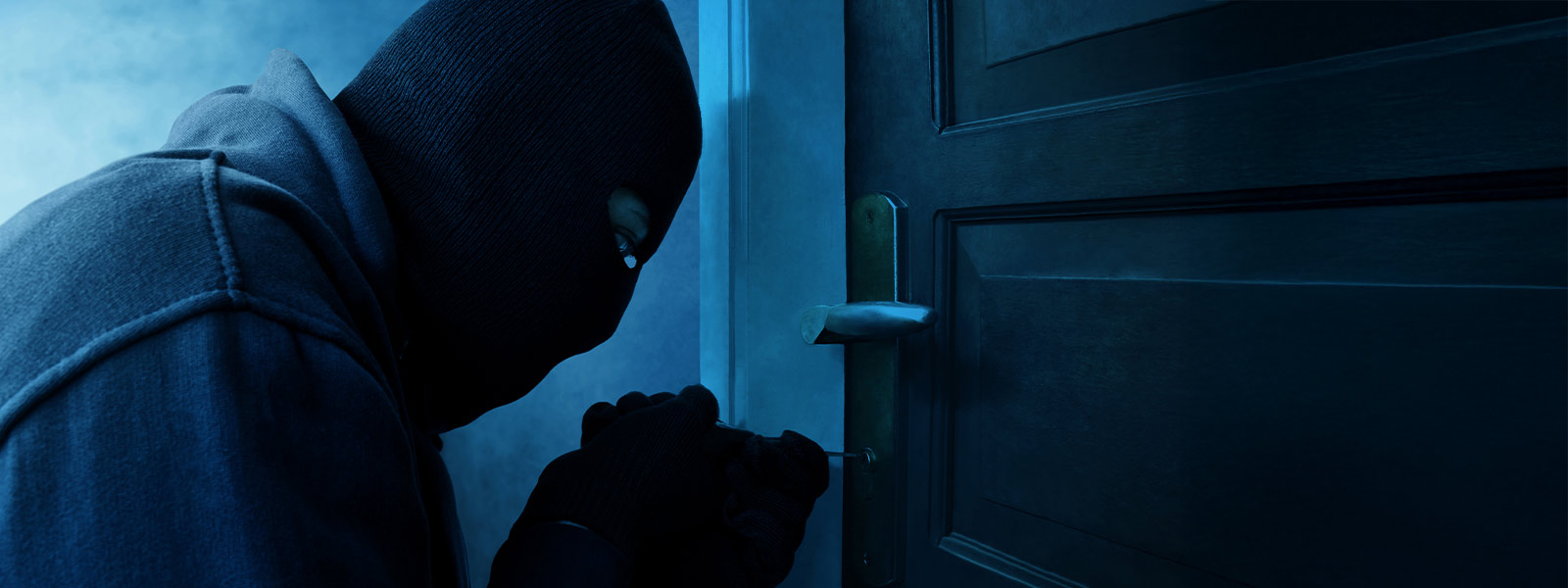 Person breaking into a home