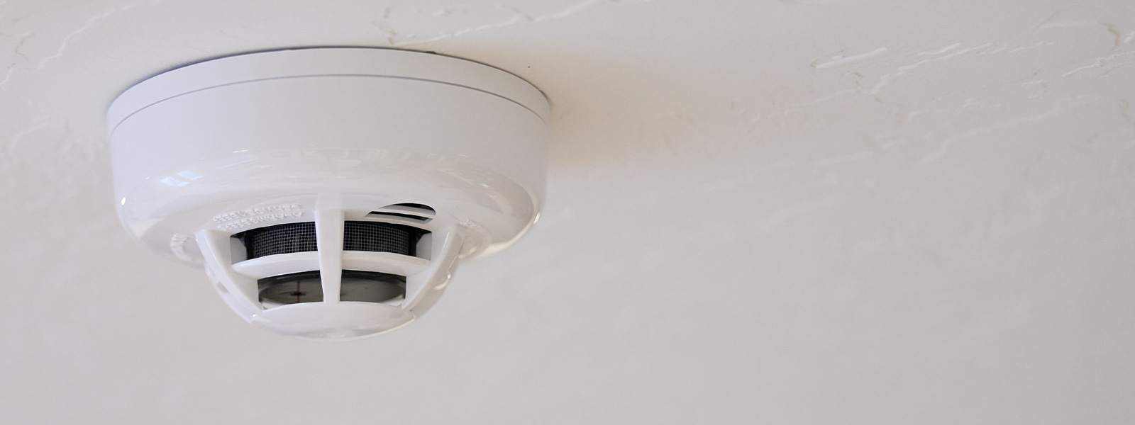 Guardian Protection heat detector on ceiling