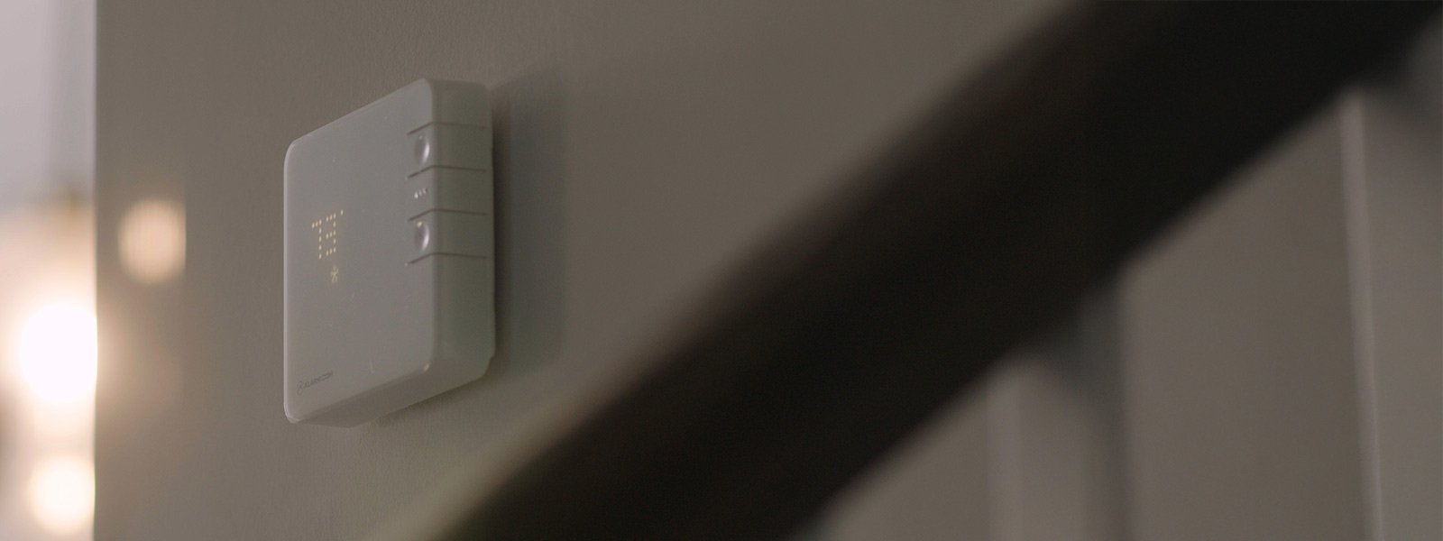 Guardian Protection smart thermostat on wall