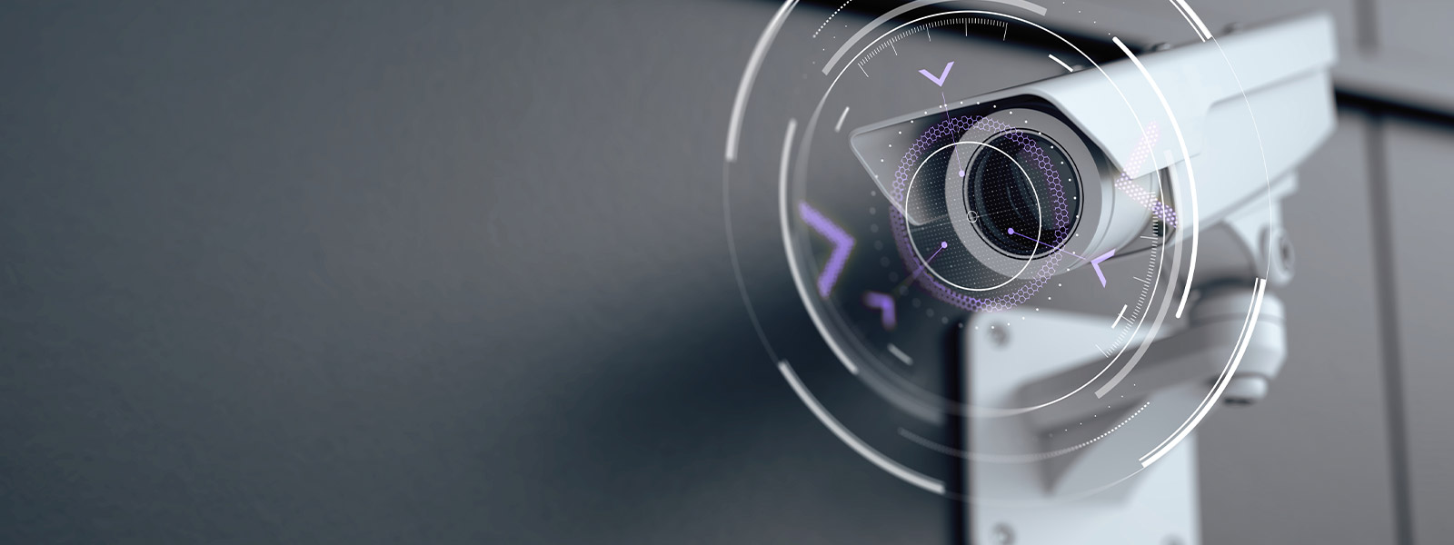 Commercial security camera installed on a business' exterior wall