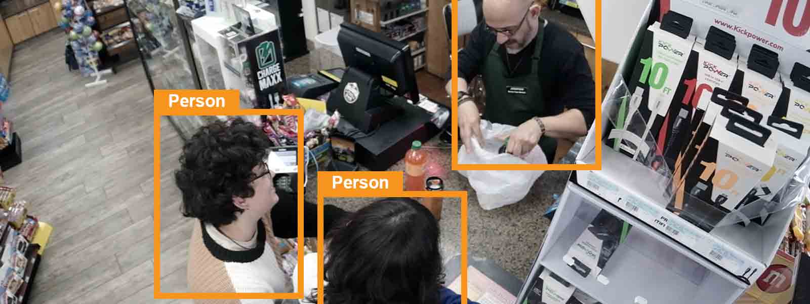 Guardian Protection's Video Analytics Camera view of two people checking out at a Convenience Store